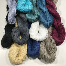 Load image into Gallery viewer, This is a 4 ply, light weight yarn that is a 100% linen in bleached white, grey, natural, medium blue, dusty green, teal, black, turquoise or ice blue.
